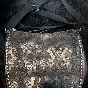 The Sak Black Floral Embossed Crossbody Bag